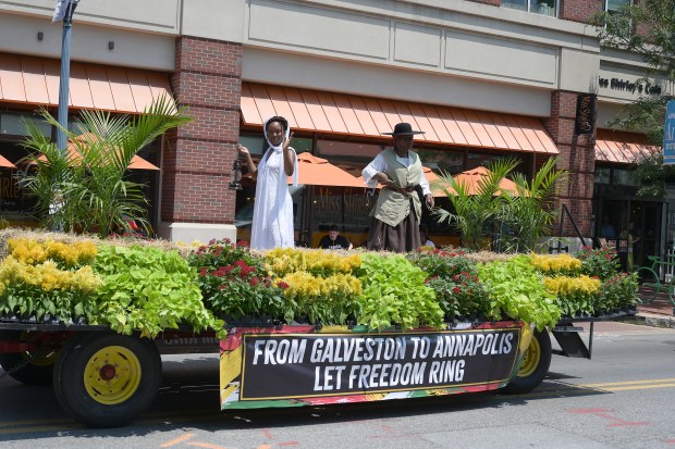 The Annapolis Juneteenth Parade makes its way up West Street Saturday afternoon. (Paul W. Gillespie/Staff photo)