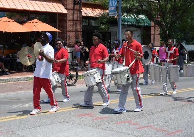 Then he Baltimore All-Stars Marching Unit performs. The Annapolis Juneteenth Parade makes its way up West Street Saturday afternoon. (Paul W. Gillespie/Staff photo)