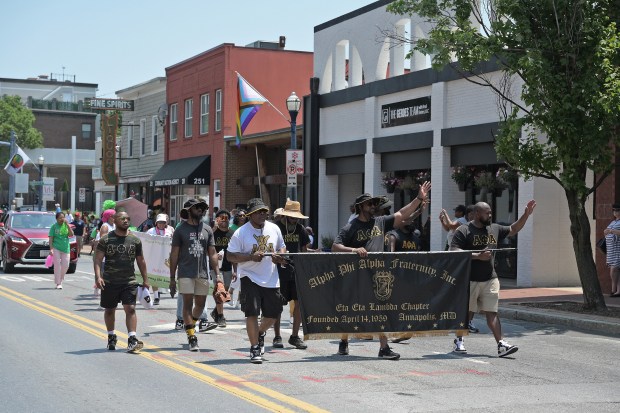 The Alpha Phi Alpha Fraternity marches. The Annapolis Juneteenth Parade makes its way up West Street Saturday afternoon. (Paul W. Gillespie/Staff photo)