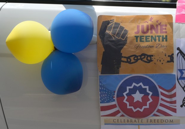 The Annapolis Juneteenth Parade makes its way up West Street Saturday afternoon. (Paul W. Gillespie/Staff photo)