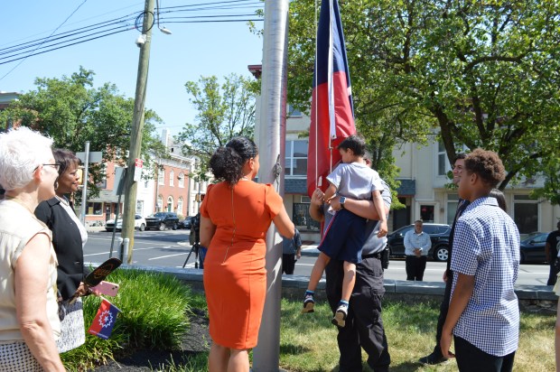 Attendees of a June 18, 2024 ceremony look on as...