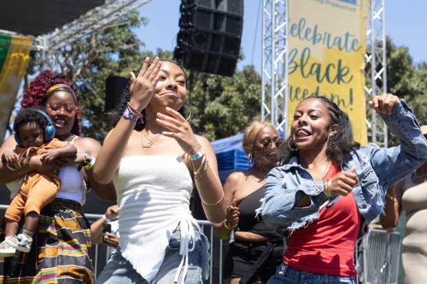 From left, Nia Jones and Lauren Jones dance during Long...