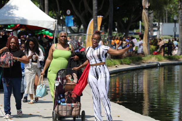 Shawnda Douglas of Long Beach was dancing to the music...