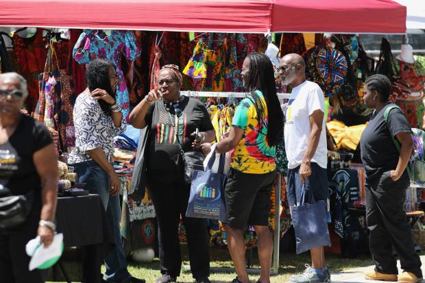Large crowds attend the the 3rd annual Juneteenth celebration on...