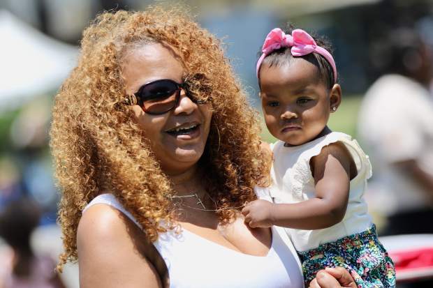 Kathy Timmons of San Pedro enjoys the Juneteenth celebration with...