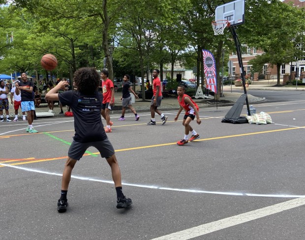 The youth and adult 3-on-3 basketball street tournament was run...