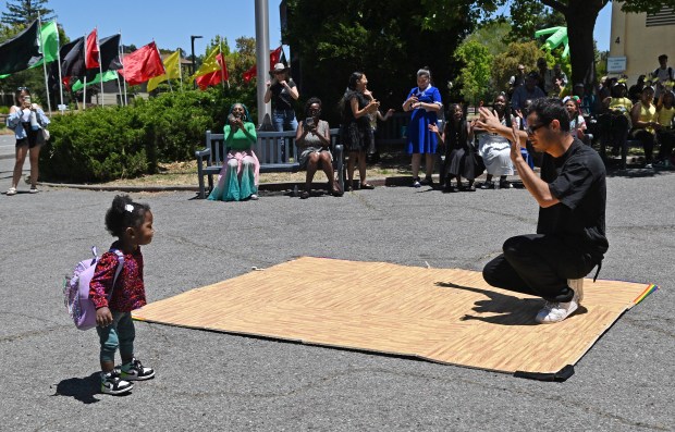 One-and-a half year old Gaia Warren of Marin City dances...