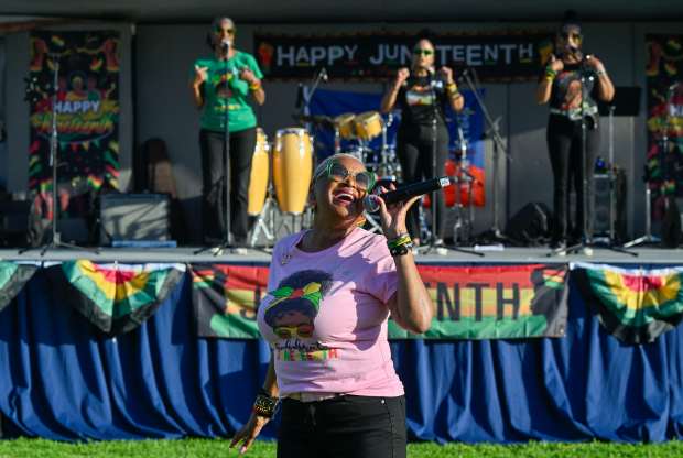 April Miller, also known as Peaches, performs with Diamond Singers...