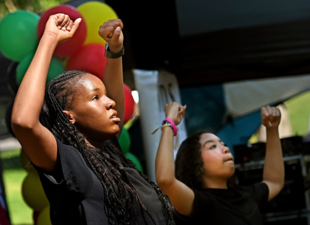 Members of The Village SBC, from left, Myla Gibson and...