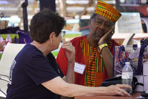 Dr. George Stevens visits with Loveland Mayor Jacki Marsh at Heart and Sol's fourth annual Juneteenth Freedom Day celebration, held Saturday at Backyard Tap.(Jocelyn Rowley/Loveland Reporter-Herald)