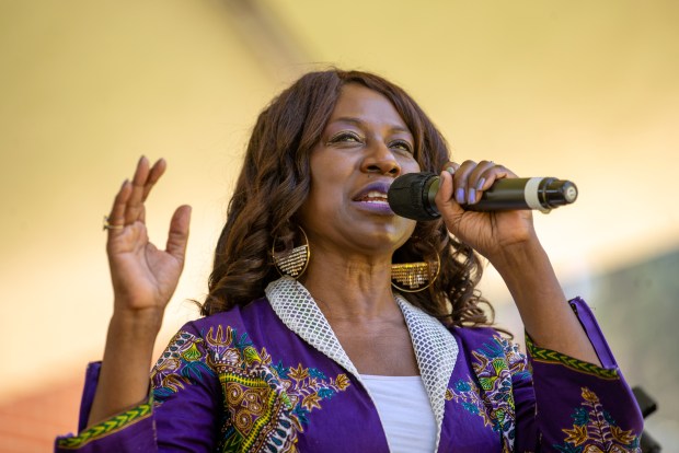 Fontana resident Valerie Singleton Evans sings the Black national anthem...