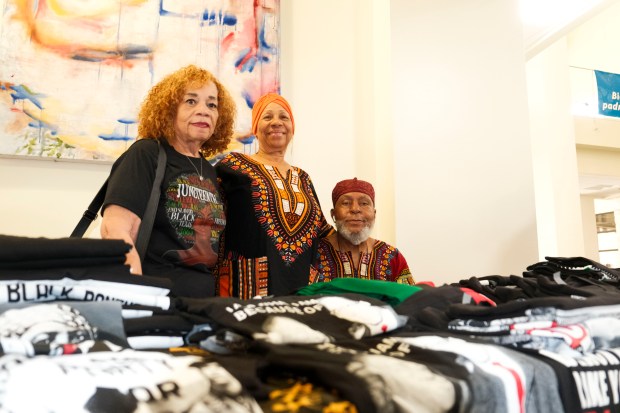 From left, Gloria Woods, Patricia Hasan, and Rashad Hasan are...