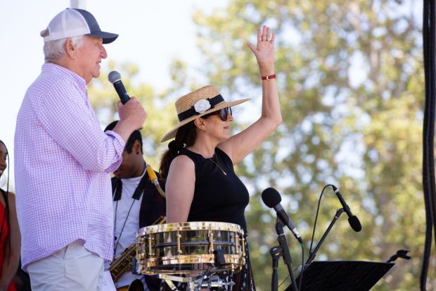 Manhattan Beach Mayor Pro Tem Amy Howorth waves to the...