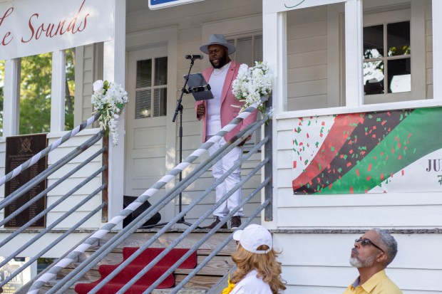 Tshombe Selby sings at the fourth annual Juneteenth celebration in...